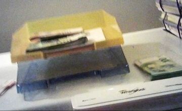 FOTO: Podozrivé zábery z domu Ferenčáka. 45-tisíc v hotovosti, 75-tisíc na účet